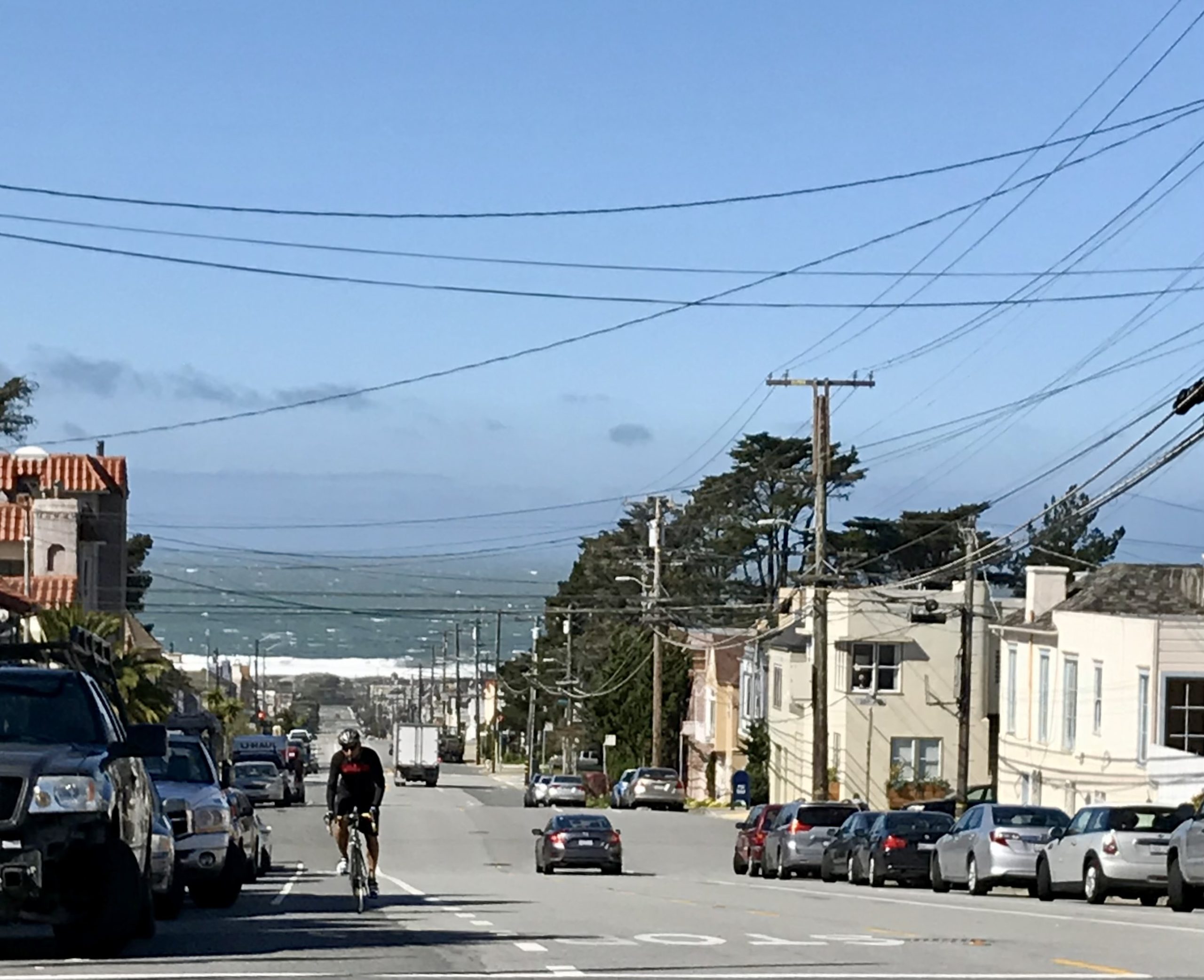 Residential street sloping toward the ocean in the Outer Richmond, San Francisco